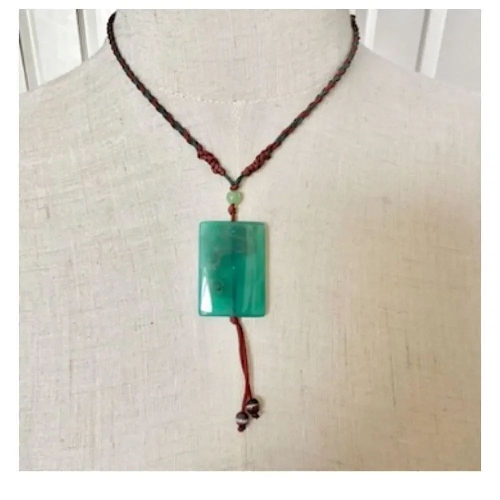 Green dyed agate pendant necklace on cord